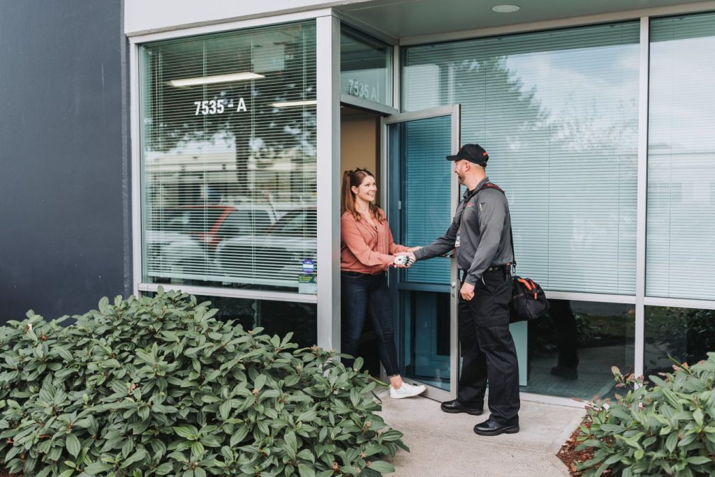Woman meeting with A&A Pest Control technician