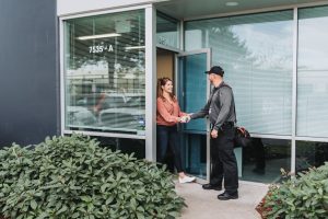 Woman meeting with A&A Pest Control technician