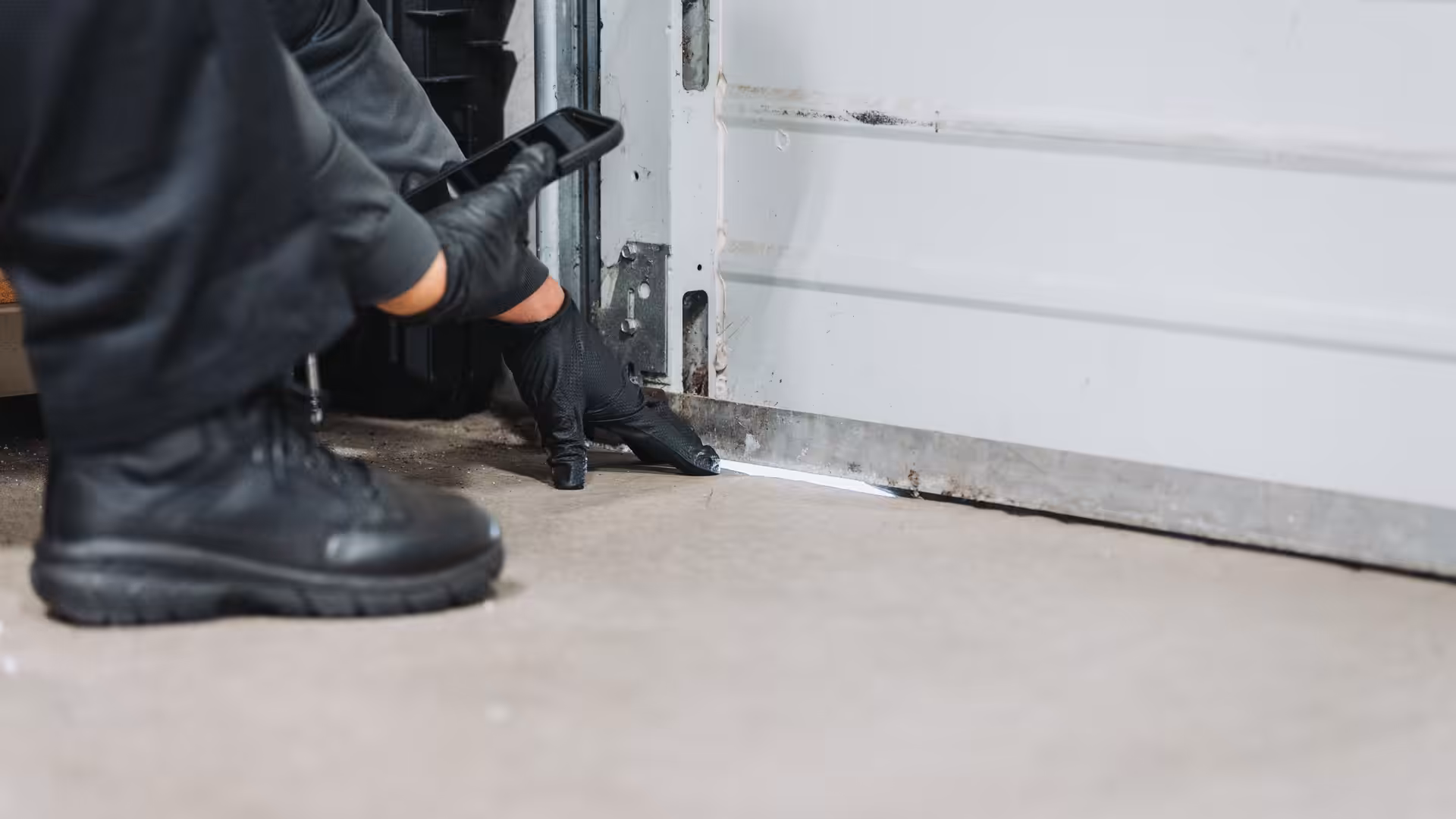 Rodent garage door entry prevention